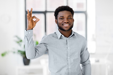 Image showing african american businessman at office showing ok