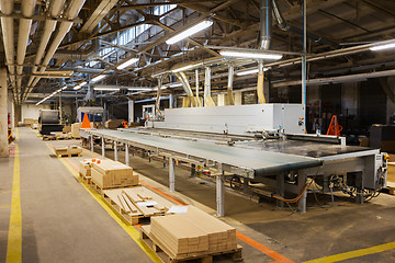 Image showing chipboards on conveyer at furniture factory