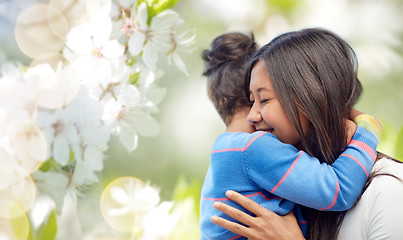 Image showing happy mother and daughter hugging