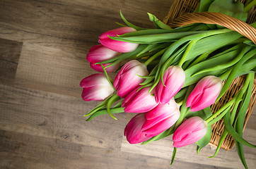 Image showing Beautiful bouquet from pink tulips  on a table