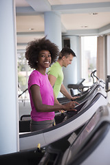 Image showing people exercisinng a cardio on treadmill in gym