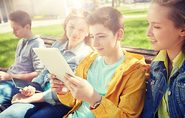 Image showing group of students with tablet pc at school yard