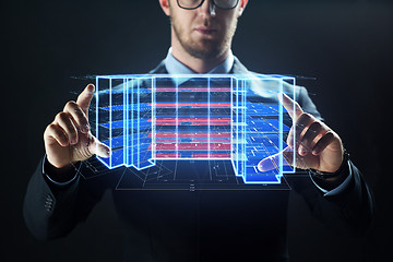 Image showing close up of businessman with virtual projection