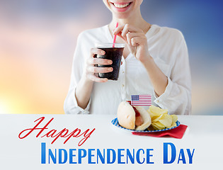 Image showing happy woman celebrating american independence day