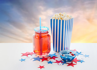 Image showing drink and popcorn with candies on independence day