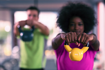 Image showing couple  workout with weights at  crossfit gym