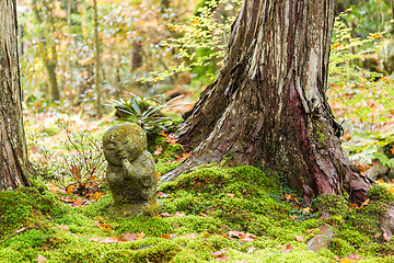 Image showing Adorable statue in Japanese temple in autumn