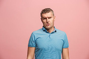 Image showing Beautiful bored man bored isolated on pink background