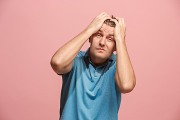 Image showing Handsome man in stress isolated on pink