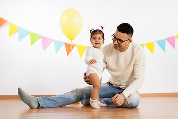 Image showing happy father and little daughter at birthday party