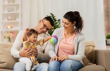 Image showing happy family with baby daughter at home