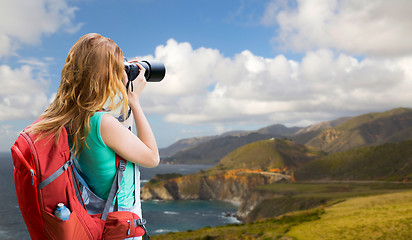 Image showing woman with backpack and camera at big sur coast