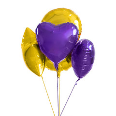 Image showing close up of helium balloons over white background