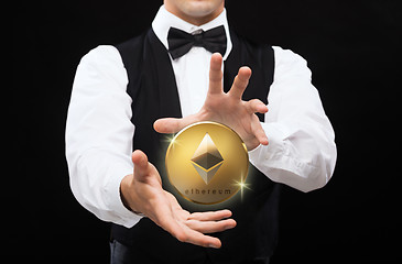 Image showing close up of magician with ethereum coin