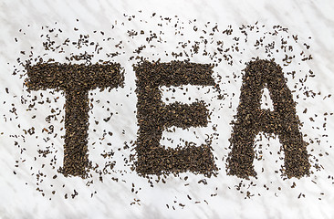 Image showing The word TEA written with Gunpowder green tea leaves