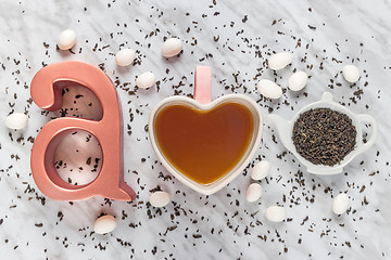 Image showing Green tea and white chocolate flat lay composition