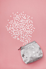 Image showing Silver purse and shiny hearts