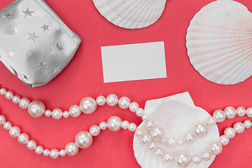 Image showing Pearl jewelry and blank card on pink background