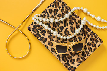 Image showing Fashion accessories on yellow background