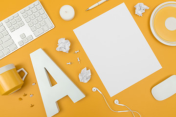 Image showing Vibrant white and yellow home office workspace