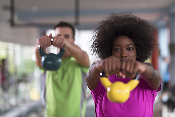 Image showing couple  workout with weights at  crossfit gym