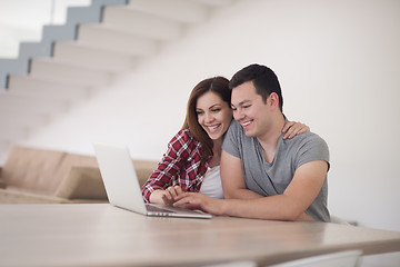 Image showing happy young couple buying online