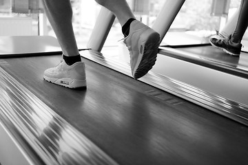 Image showing sportsman exercise jogging on treadmill