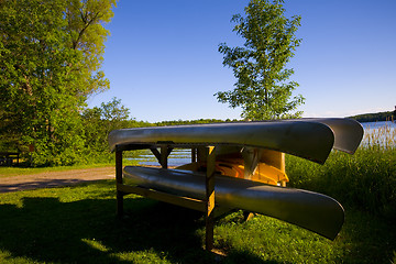 Image showing Canoes Resting by Lake