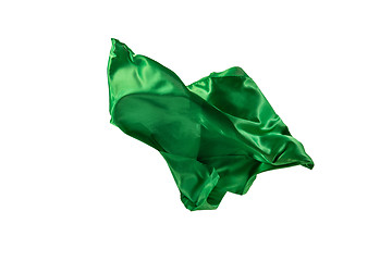 Image showing Smooth elegant transparent green cloth separated on white background.