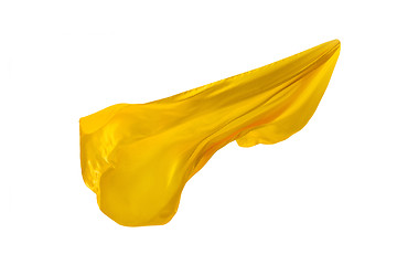 Image showing Smooth elegant transparent yellow cloth separated on white background.