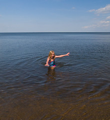 Image showing Girl Escaping Cold Water