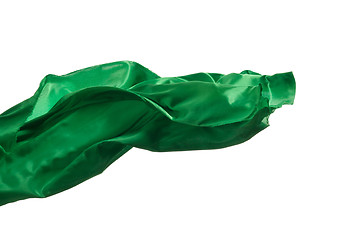 Image showing Smooth elegant transparent green cloth separated on white background.