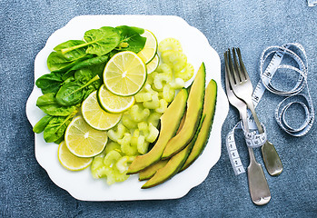 Image showing slice of fresh lime and avocado
