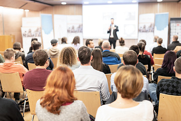 Image showing Business speaker giving a talk at business conference event.