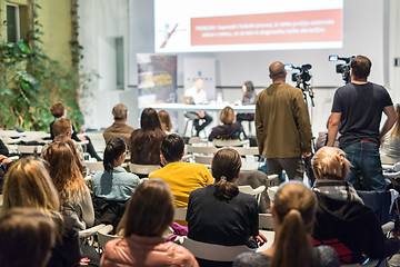 Image showing Media interview and round table discussion at popular scientific conference.