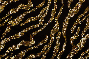 Image showing Black fabric with golden sequin pattern 