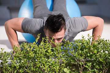 Image showing man doing morning yoga exercises