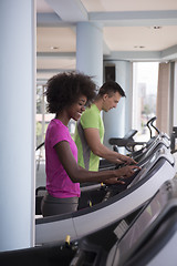 Image showing people exercisinng a cardio on treadmill in gym