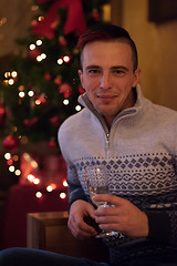 Image showing Happy young man with a glass of champagne