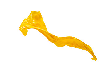 Image showing Smooth elegant transparent yellow cloth separated on white background.