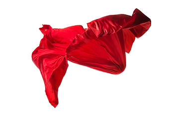Image showing Smooth elegant transparent red cloth separated on white background.