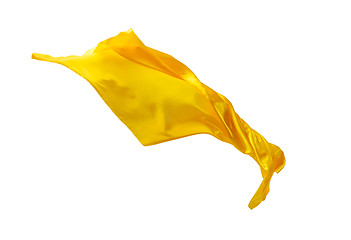 Image showing Smooth elegant transparent yellow cloth separated on white background.