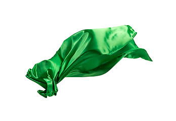 Image showing Smooth elegant transparent green cloth separated on white background.