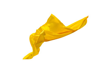 Image showing Smooth elegant transparent yellow cloth separated on white background.