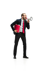 Image showing Side view of a man screaming on the megaphone over white background