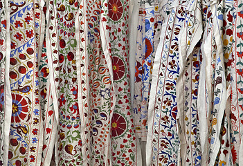 Image showing Traditional uzbek suzani embroidery fabrics at oriental bazaar