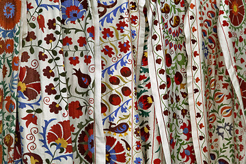 Image showing Traditional uzbek suzani embroidery fabrics at oriental bazaar