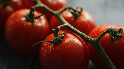 Image showing Ripe red cherry tomatoes on branch 