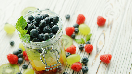 Image showing Jar filled with fresh berries