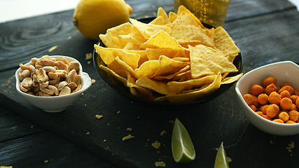 Image showing Served snacks on board on table